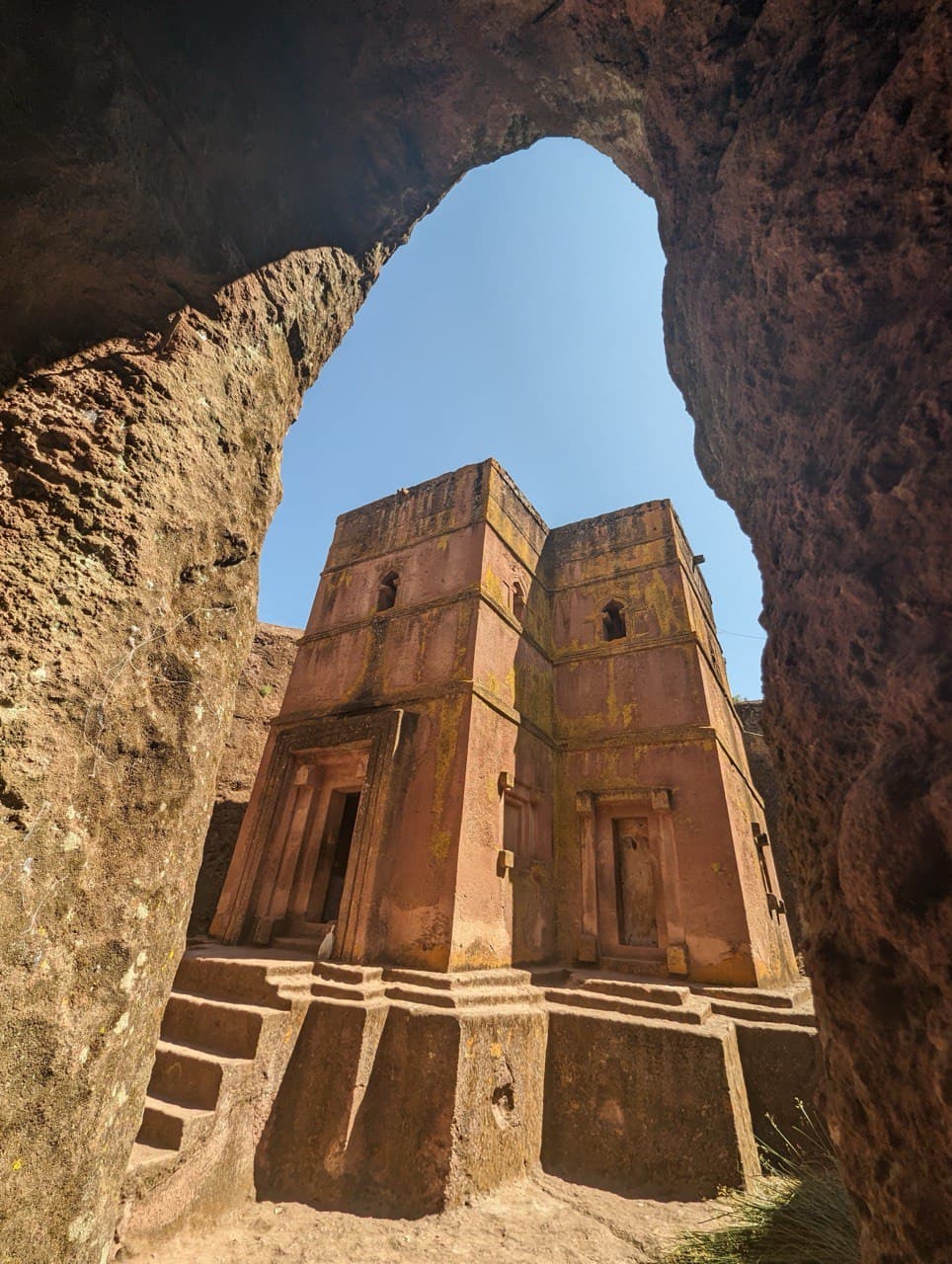 View of Lalibela's rock-hewn church towers framed by an archway