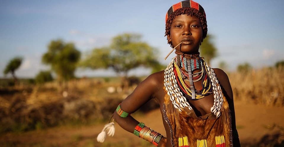 Young Hamer tribe girl in traditional beaded jewelry, South Ethiopia
